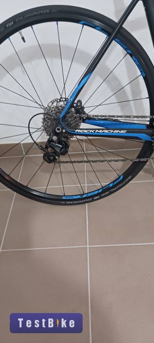 Rock Machine RaceRide 900 Carbon Disc (54 cm) + extrák