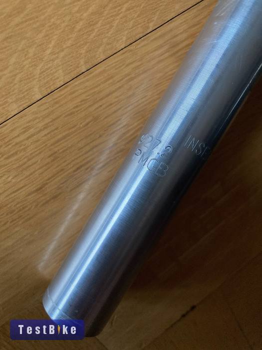 Rugós 300x27.2-es nyeregcső PostModerne Glide + bilincs